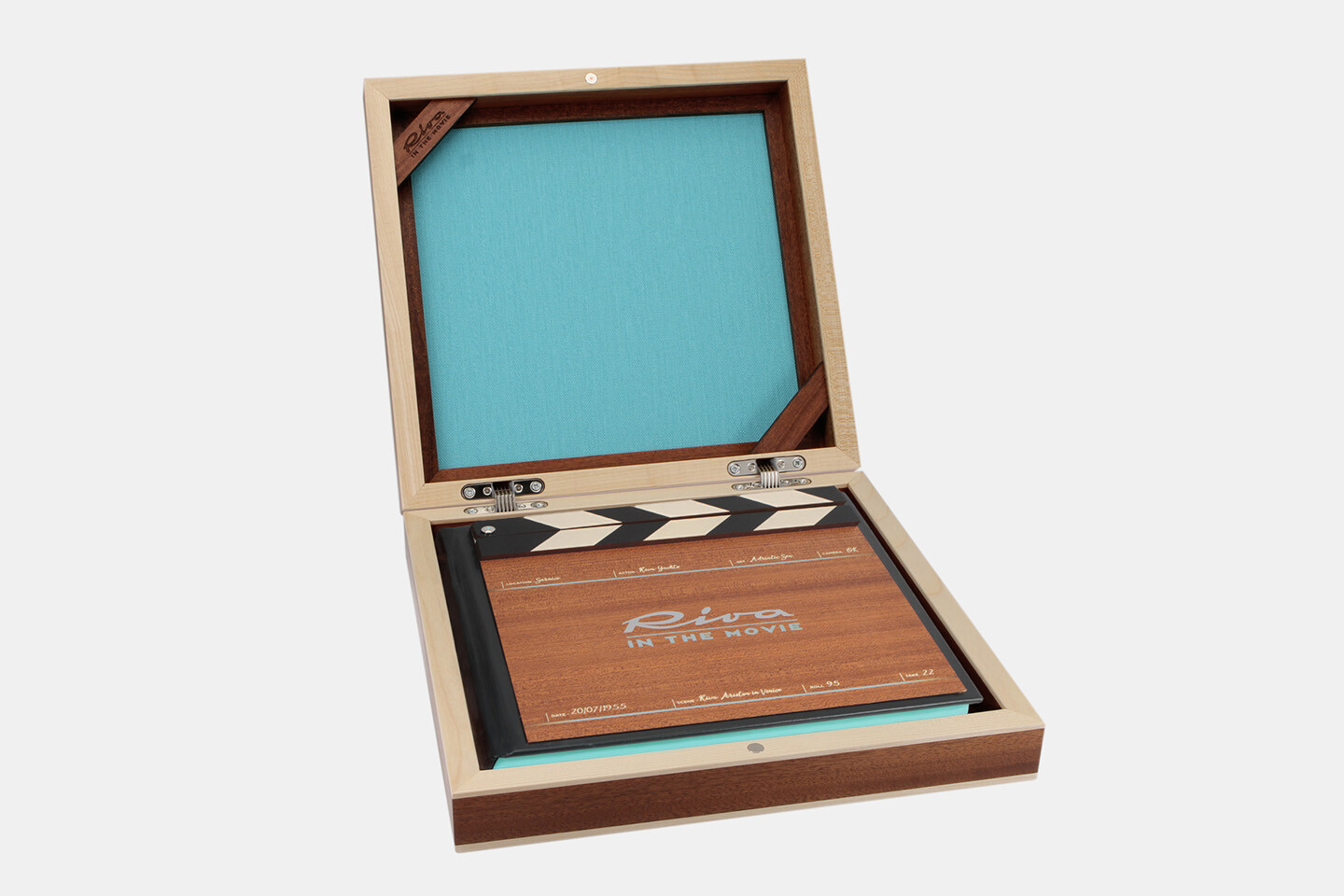 Riva's unmistakable aquamarine thread<br>runs through more than 60 years of cinema - Riva Boutique